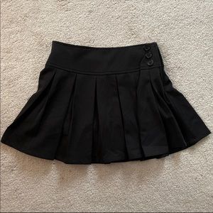 black pleated skirt
